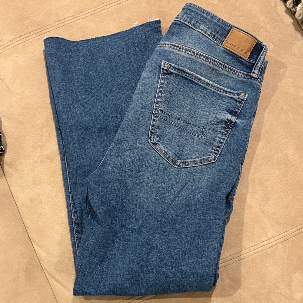 AE next level stretch, kick boot crop jeans